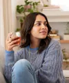 li-woman-holding-tea.webp