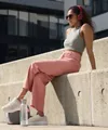 li-woman-sat-outdoors.webp