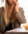 li-woman-eating-protein-chips.webp